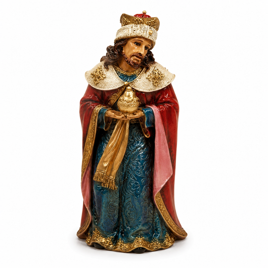 Decorative figurine of a king holding a crown on a white background