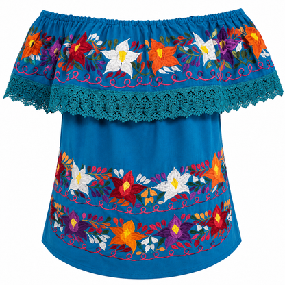 Blue top with colorful floral embroidery on a white background
