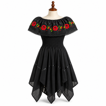 Black dress with red floral embroidery on a mannequin against a white background