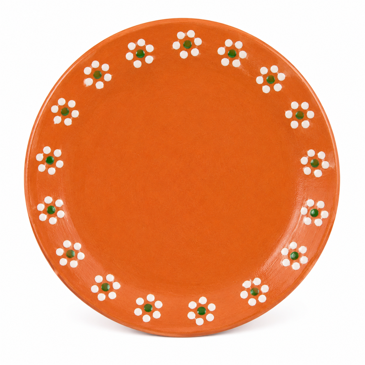 Orange plate with white floral patterns on a white background