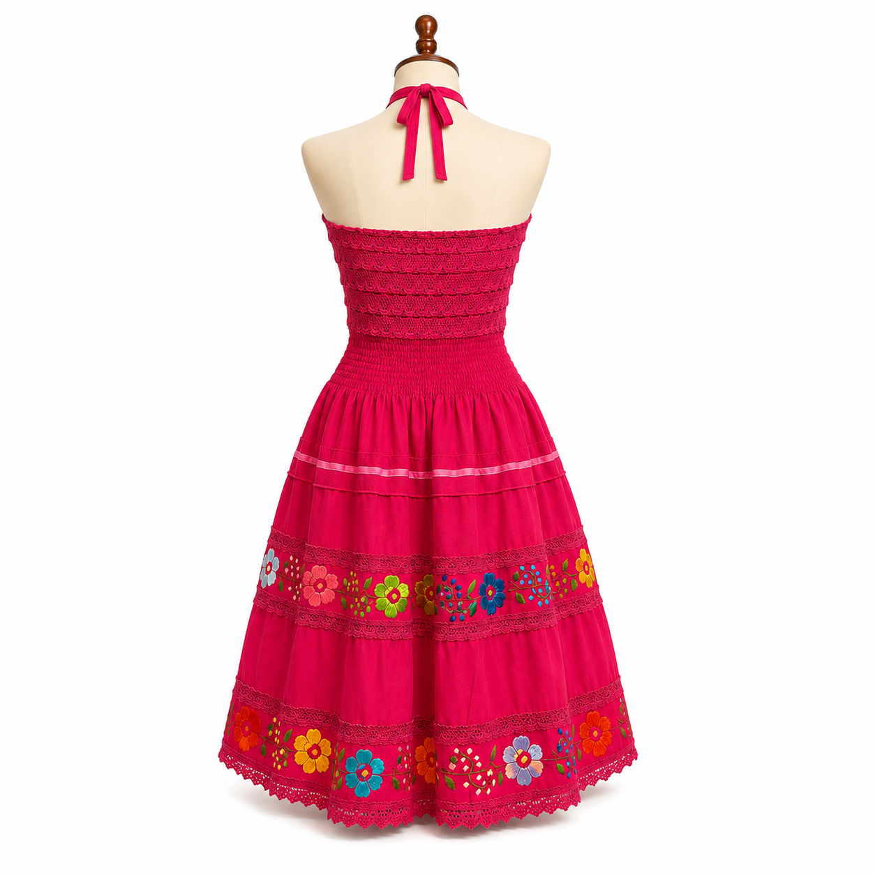 Red dress with floral embroidery on a mannequin against a white background